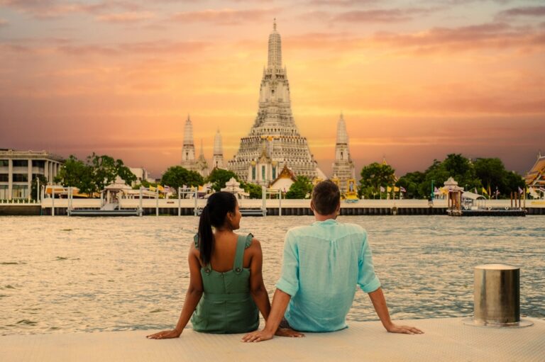 A,Couple,Relaxes,By,The,Chao,Praya,River,As,They